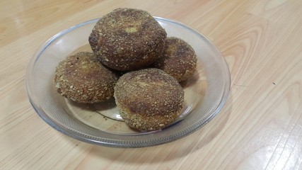Closeup perspective view of fried pizza bombs or balls are altered form of pizza