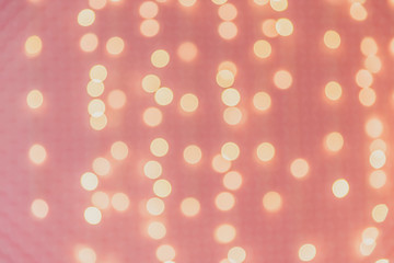 New year card with bokeh golden particles and sparks. Abstract Christmas defocused background.