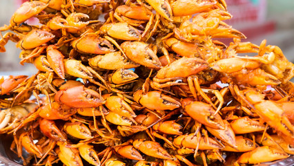 Myanmar , Mandalay street food at Ubeng bridge , fried crab.
