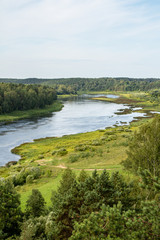 Fototapeta na wymiar View to river Daugava from Vasargeliski (Vasargelišķi) view tower on a summer day in Latgale in Latvia