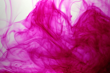 Pink Color drops in water background