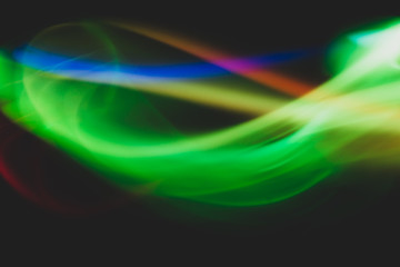 Colorful light traces with long exposure. abstract blurred lights background