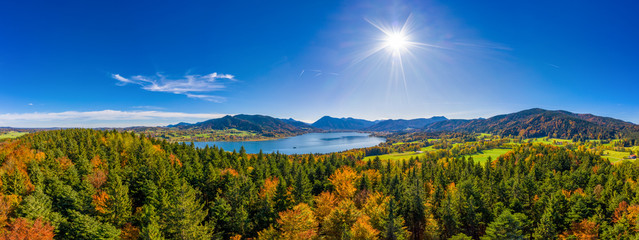 Fantastic panoramic view over the bavarian lake Tegernsee in autumn with fall colors, made by a...