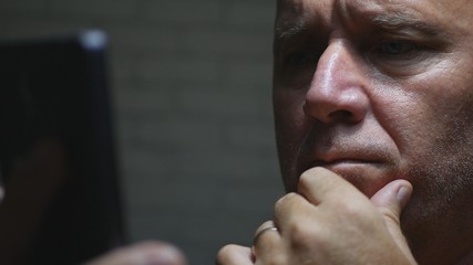 Worried Businessman Image in Dark Room Using Smartphone Wireless Communication
