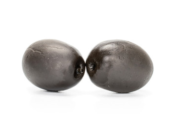 Group of two whole canned black olive isolated on white background