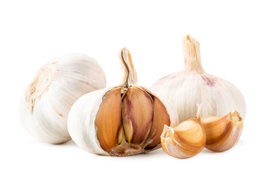 Two garlic, half and slices close-up on a white background. Isolated.