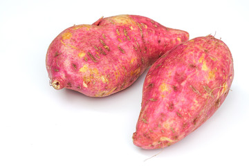 The sweet potatoes isolated on white background.