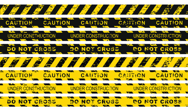 Seamless grunge security yellow black diagonal stripes. Safety danger ribbon signs.Warn Caution symbol. Under construction, do not cross. Isolated on white background.