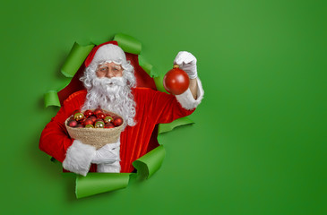 Santa Claus on color background.