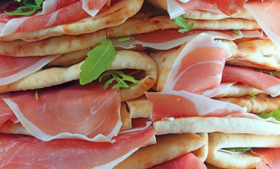 sandwiches called Spianata or Piadina in Italian with ham