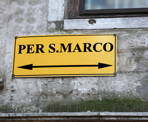 signpost withof Saint Mark in Venice in Italy