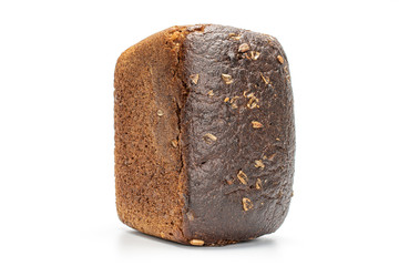 One whole fresh baked dark bread loaf isolated on white background
