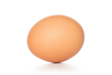 One whole chicken egg isolated on white background