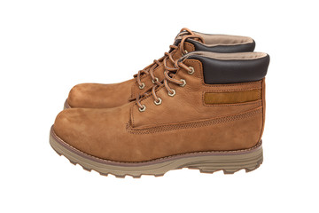 Men's brown leather boots. Stylish winter shoes , isolated on white