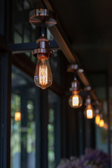 Close up of Illuminated light bulb with copy space.