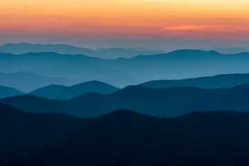  Scenic drive from Cowee Mountain Overlook on Blue Ridge Parkway at sunset time. © Chansak Joe A.