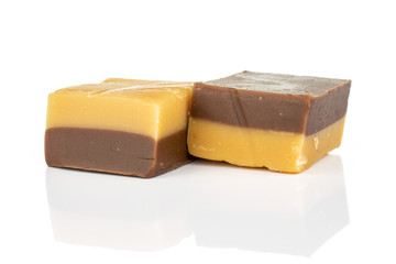 Group of two whole sweet brown caramel chocolate candy isolated on white background