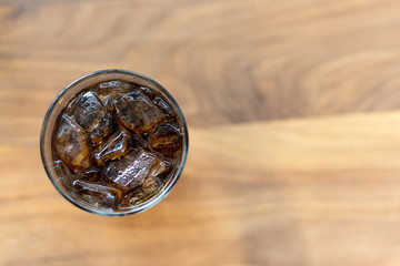glass of cola with ice with copy-space
