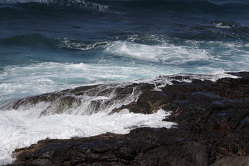 waves crashing on the rocks