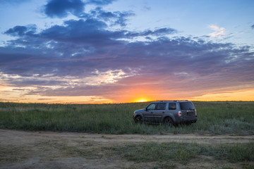 Fototapeta na wymiar car at sunset
