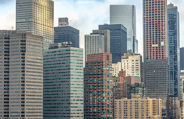 Fototapeta na wymiar View of buildings in New York City from Brooklyn Bridge in the morning.