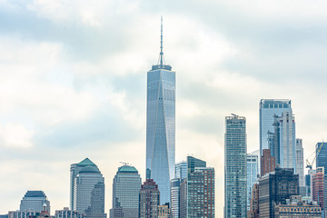 Fototapeta premium View of New York City from Brooklyn Bridge in the morning with cloudy day