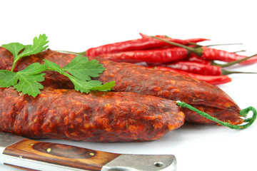 whole chorizo on a white background