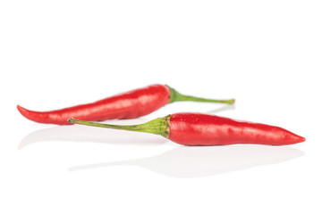 Fototapeta na wymiar Group of two whole hot red chili isolated on white background