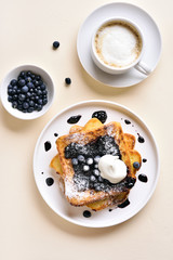 French toasts with blueberry sauce
