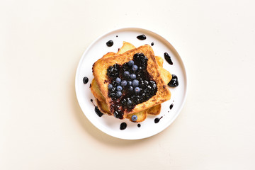 French toasts with blueberry sauce