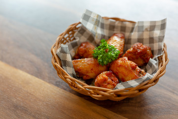 Barbecue chicken wings in the basket.