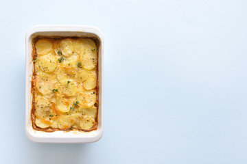 Potato gratin in baking dish