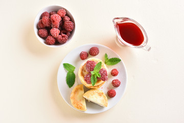 Cottage cheese pancakes with fresh raspberries