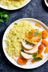Chicken breasts in apricot sauce and couscous