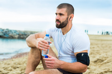 man resting after strenuous training