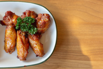 Barbecue chicken wings in the basket.