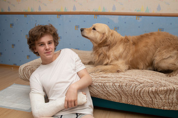 A broken arm. Fracture of the forearm at the teenager. Arm in plaster.