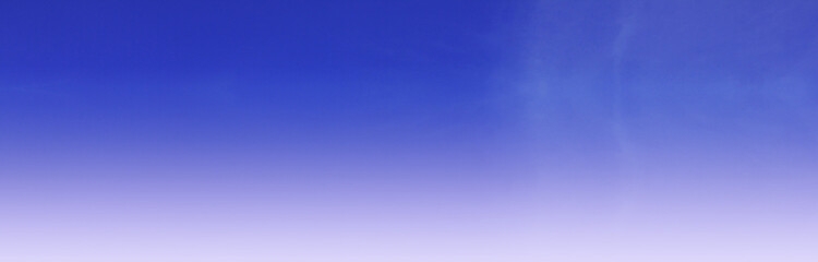 Sky background of gradient blue color. Dark to light blue, purple and white horizon banner. Empty colorful mesh copy space