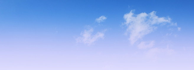 Naklejka na ściany i meble Cloudy sky background. Light blue sky texture. Nature image with sunny skyline view