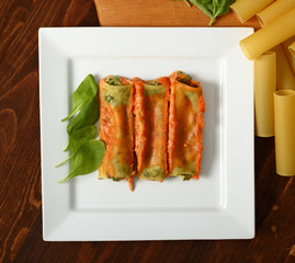 Cannelloni verdi. Pasta with spinach and ricotta.