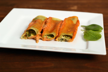 Cannelloni verdi. Pasta with spinach and ricotta.