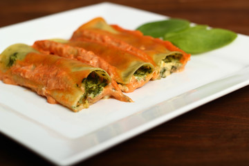 Cannelloni verdi. Pasta with spinach and ricotta.