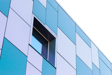 Fototapeta na wymiar Geometric color elements of the building facade with planes, lines, corners with highlights and reflections for the abstract background and texture of white, turquoise, blue colors. Place for text