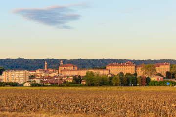 view of the municipality of Agliè, in Piedmont Italy/ view of the municipality of Agliè in Piedmont Italy, with the ducal castle on the right World Heritage Site Unesco