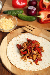 Making Tortilla with chicken and bell pepper. Series.