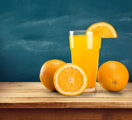 Orange juice and slices of orange on background © BillionPhotos.com