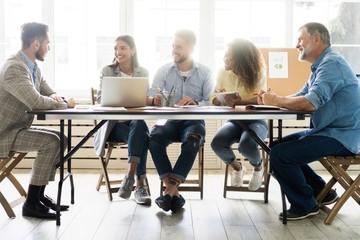 Colleagues at an office meeting
