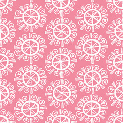 Pink seamless pattern with cute hand drawn white rounded doodle elements. Abstract snowflakes symbols texture for Christmas design, wallpaper, textile, wrapping paper