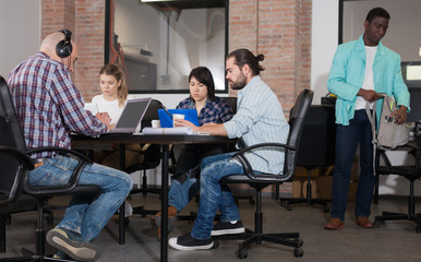 People working in co-working space