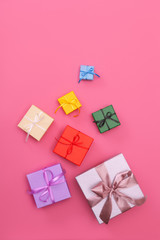 Multi-colored gift boxes with bow. Flatlay.
